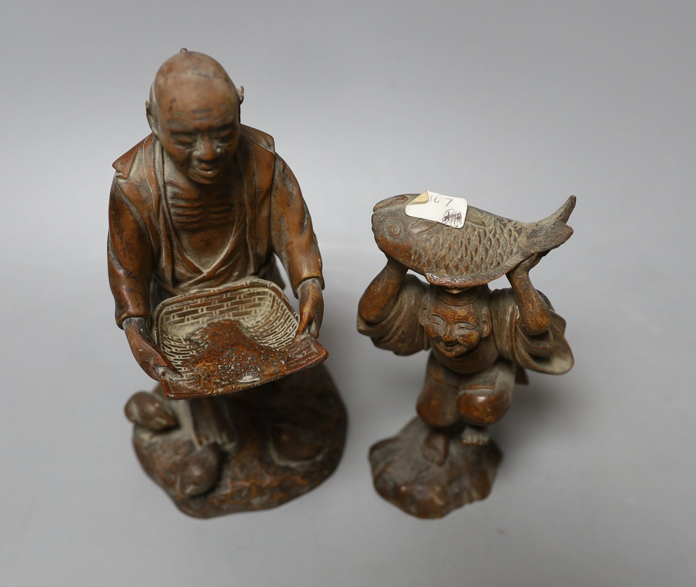 Two Japanese boxwood figures, Meiji period, tallest 15cm